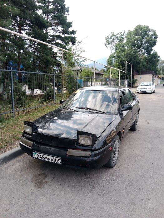 Продам машину Мазда 323