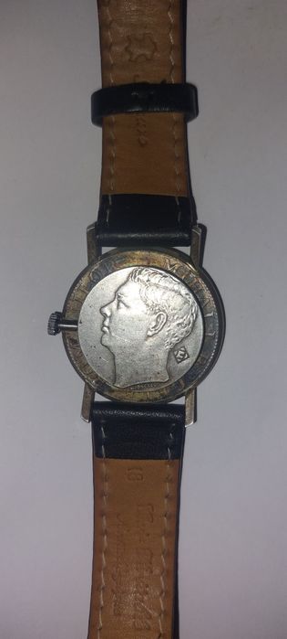 Ceas unicat double-coin 500 Lei 1944 Regele Mihai I

Mecanism elvețian A. Schild 1610A, ștanțat SWISS 17J, armare manuală. 17 rubine, func