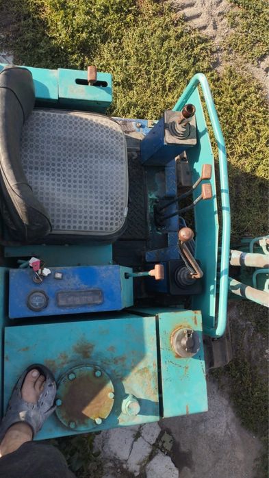 Японский миниэкскаватор Takeuchi TB