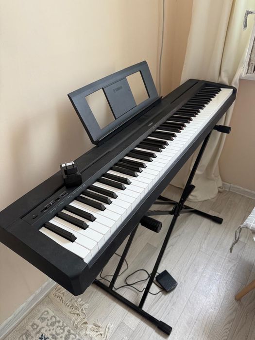 Пианино Yamaha.