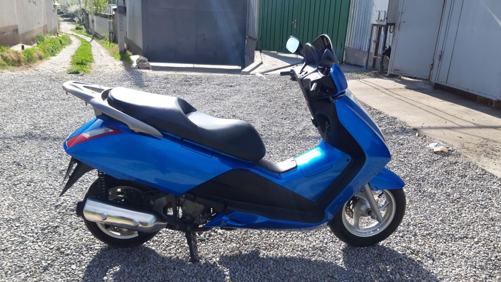 Скутер Honda pantheon