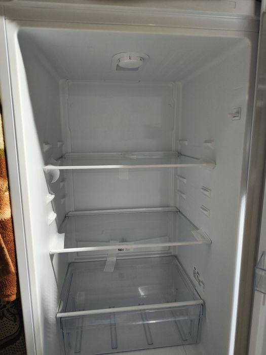 Холодильник абсолютно новый
