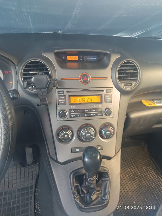 Kia carens  бензин/газ