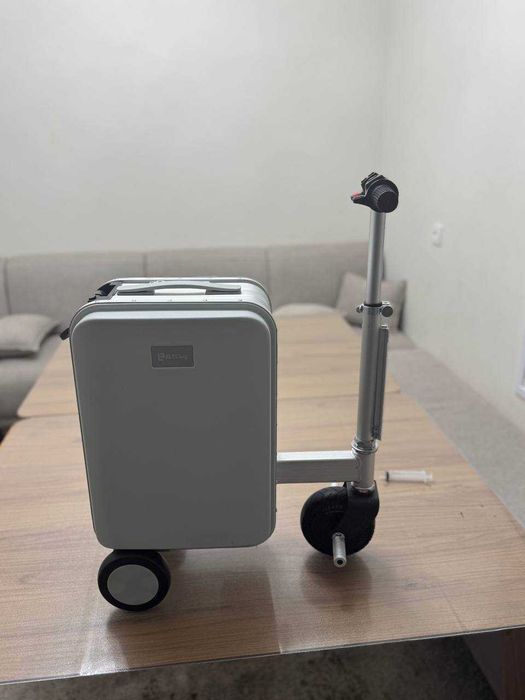 Электрический чемодан-самокат — складной