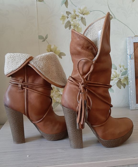 Продам кожаные сапоги