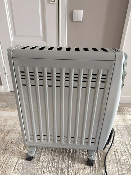 Электрический обогреватель масляный,