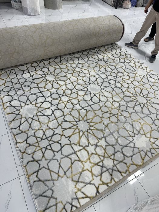 Kovrolin gilam 55000 sum