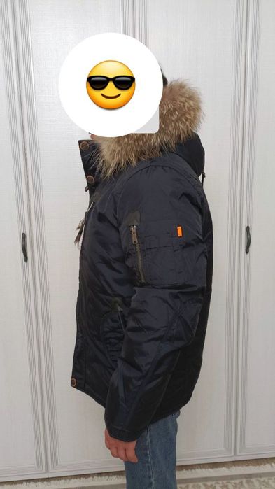 Продам новый мужской пуховик
