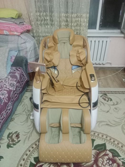 Массажный кресло