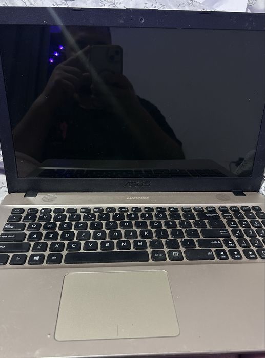 Laptop ASUS VivoBook - Intel Celeron - stare bună