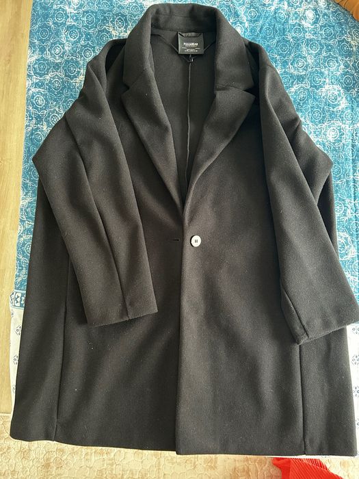 Черно изчистено палто