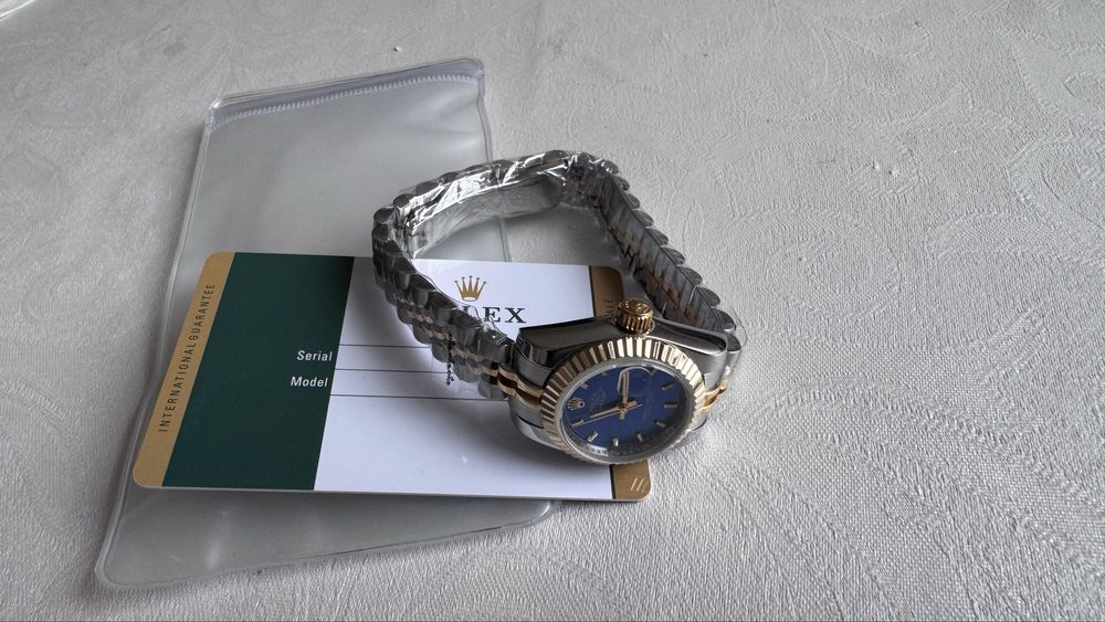 Женские часы Cartier, Rolex