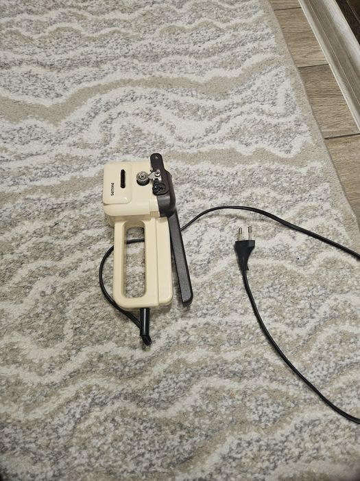 Deschizător electric