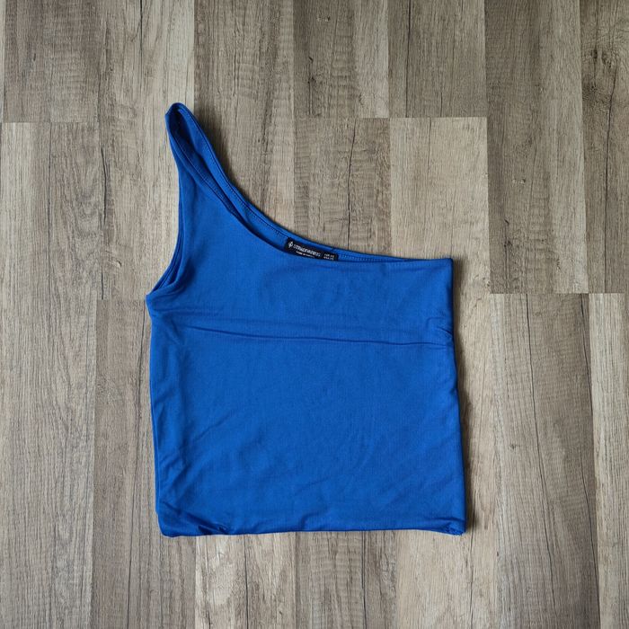 Потници, топове Stradivarius