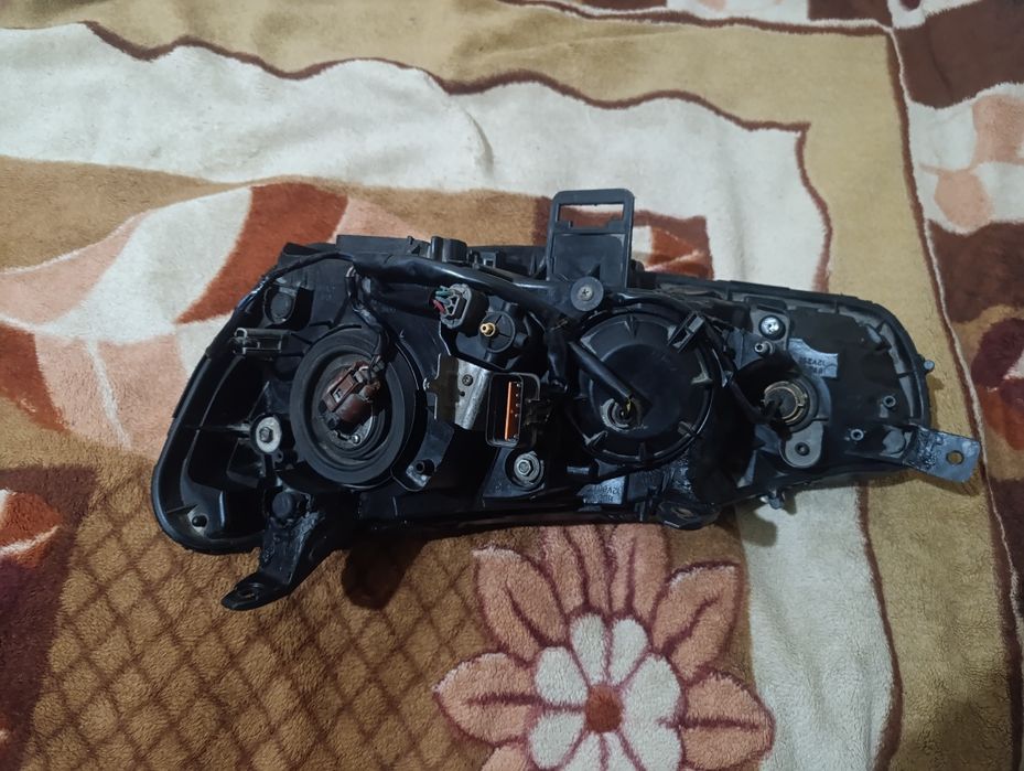 Фара на Мицубиси лансер х