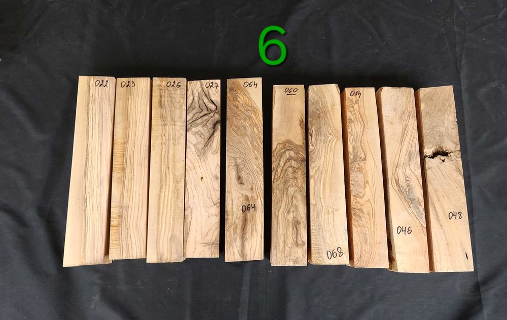 Заготовки (трупчета) от маслиново дърво (дървен материал)