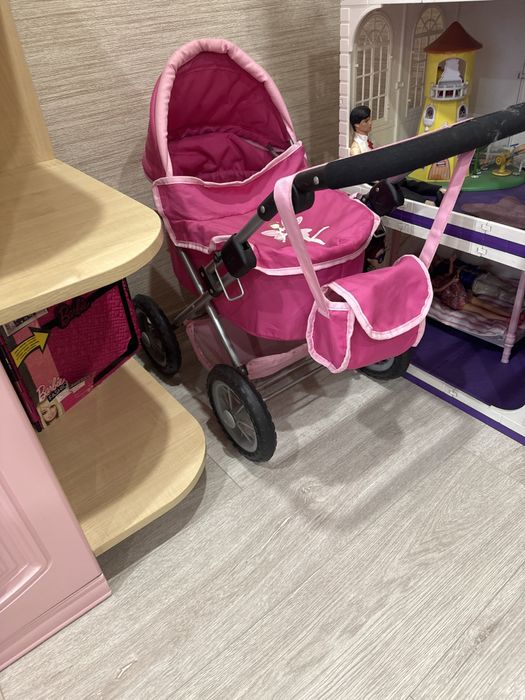 Коляска игрушка розовая детская