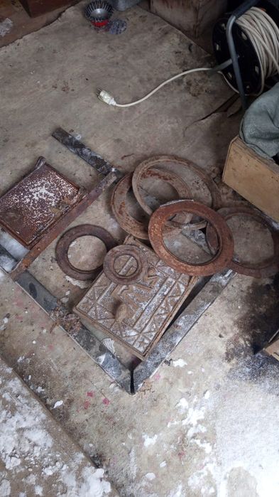 Чугунная плита с кольцами и дверцы