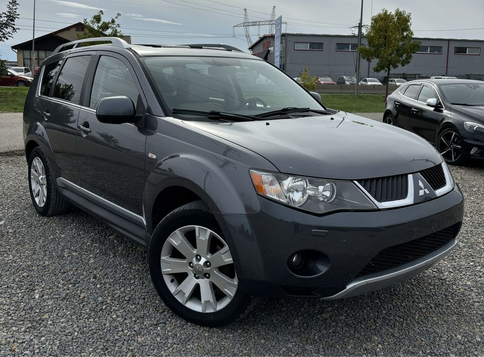 mitsubishi-outlander-7-locuri-2009-2-0-tdi-4x4-blocabil-piele-trapa