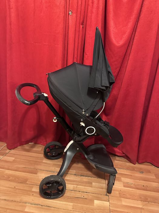 Carucior Stokke stare excelenta umbrela si geanta negru