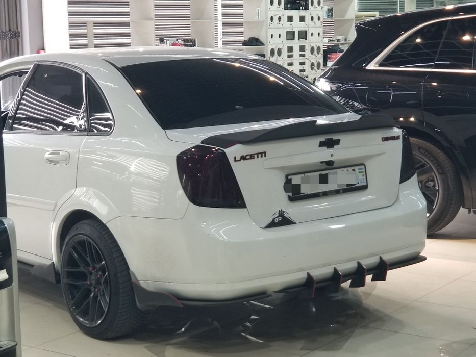 Обвес Lacetti Complekt. Обвес бампера Ласетти.