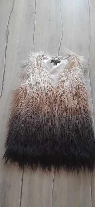 Дамски елек пухен