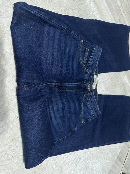 Джинсы новые
