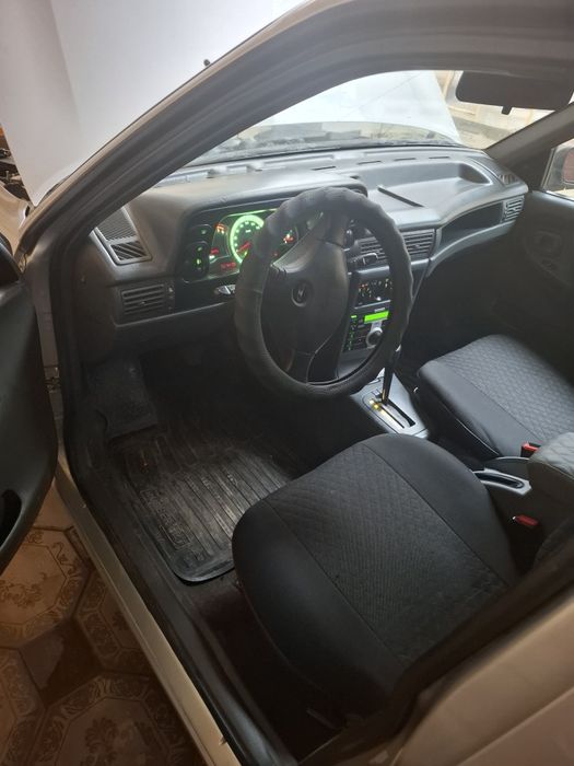 Нексия 1 автомат йили 2004 кам юриган эзилмаган кузов тетик