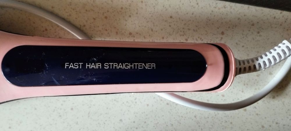 Perie electrica de îndreptat parul