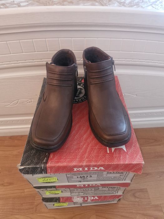 Продам обувь Mida
