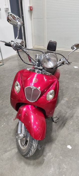 Vând scuter retro impecabil,primul propietar de nou