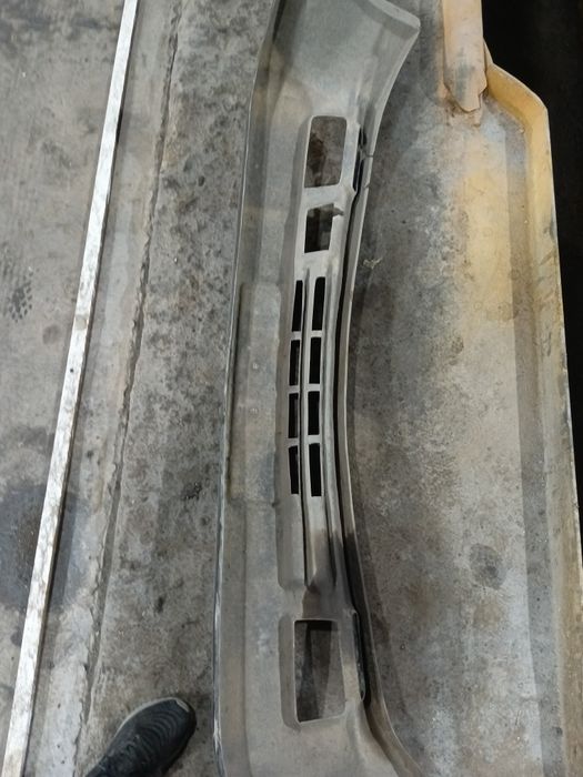 Передний бампер е34