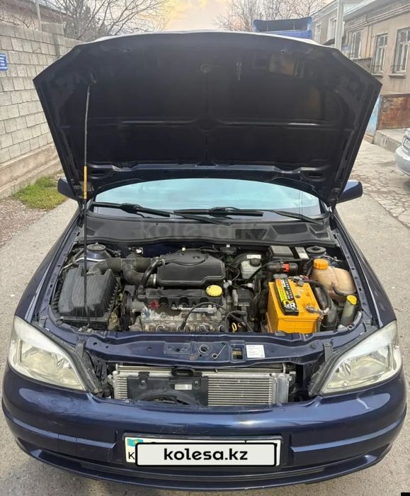 Опель астра машина