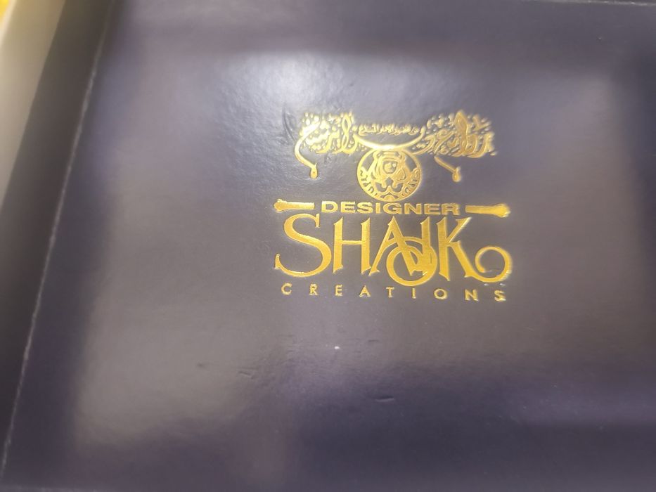 Shaik opulent Gold