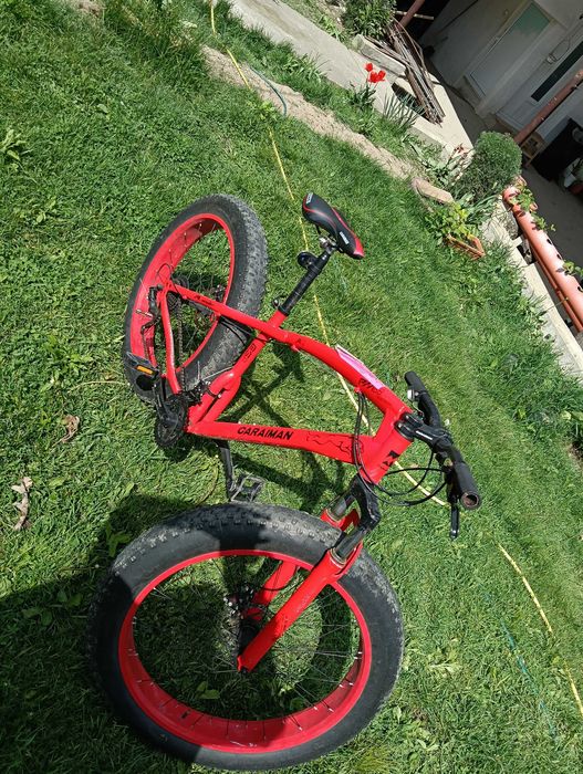 Vând bicicleta  Bicicletă FatBike Fulger by Caraiman, roți 20 inch, cauciucuri groase, frâne pe disc, roșie
