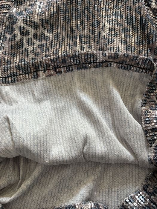 Top cu paiete și animal print Lefties