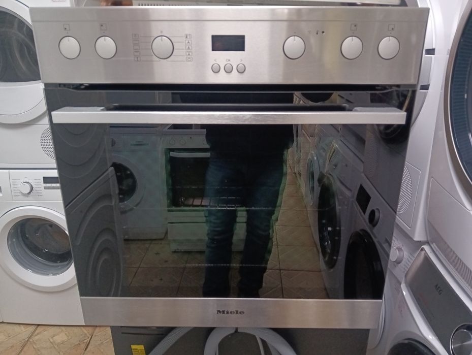 Иноксова печка за вграждане с индукционни котлони Миеле Miele Гаранция