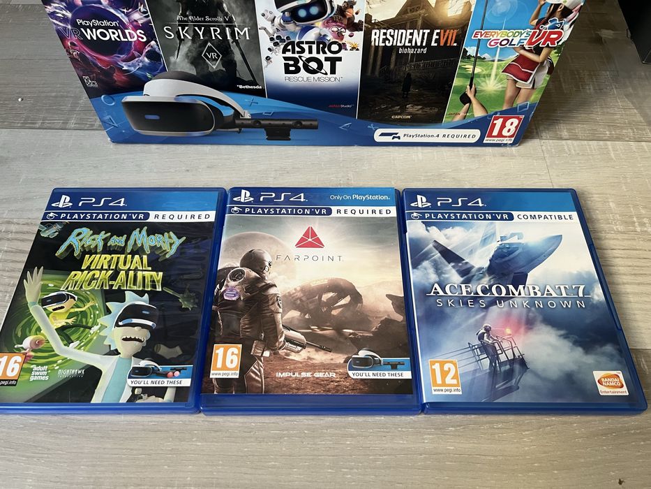 VR очила PS4 + 2 контролера + пушка + 3 игри