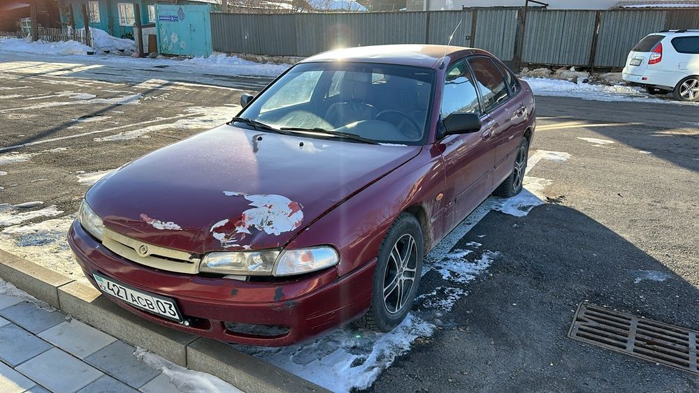 Мазад 626 Кронос