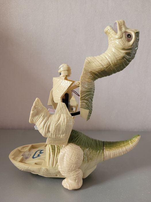 Динозавр робот трансформер