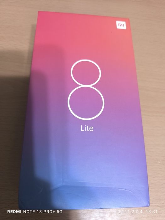 Телефон Xiaomi Mi 8 Lite