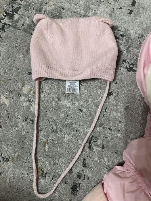 Продам комбинезон на новорожденную девочку.