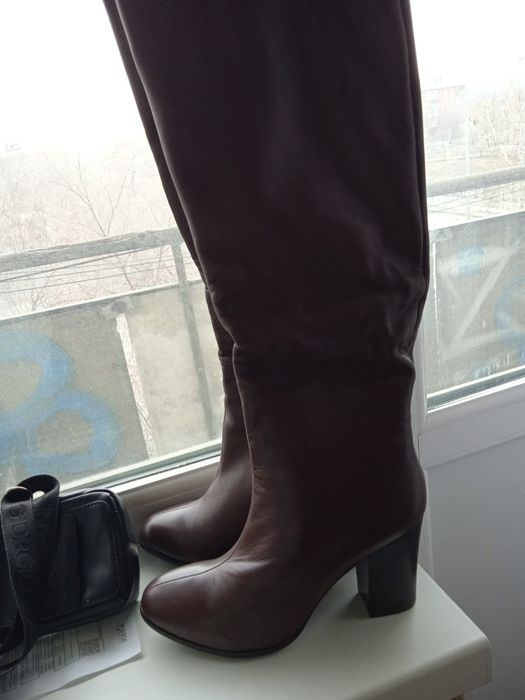 Продам сапоги новые