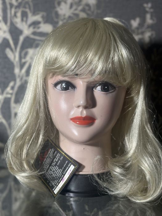 Парики и шиньоны