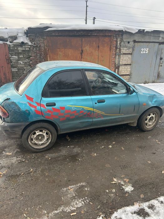 Мазда срочно 121 год 1991