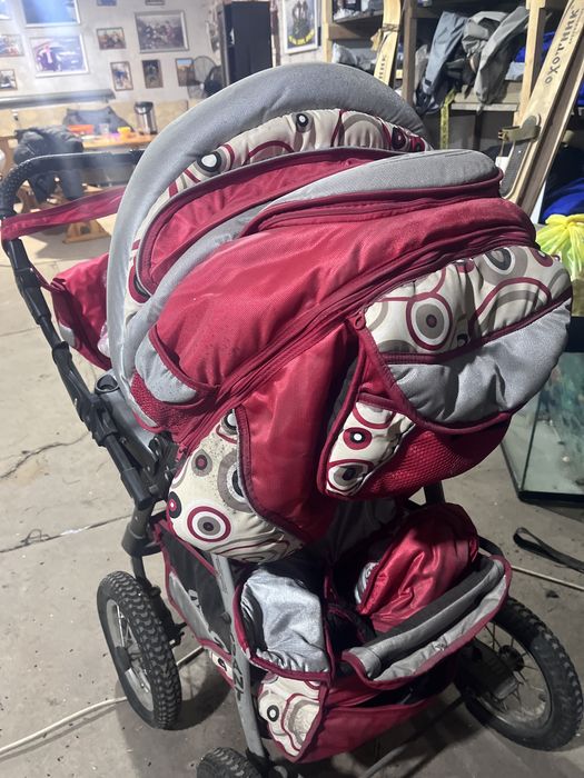 Коляска зима лето.с сумкой люлькой,маскитной сеткой