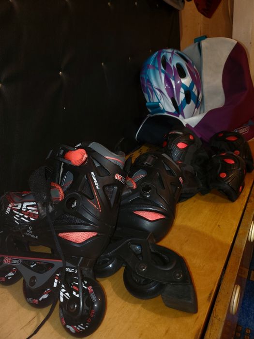 Роликовые коньки