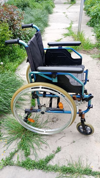 Инвалидная коляска