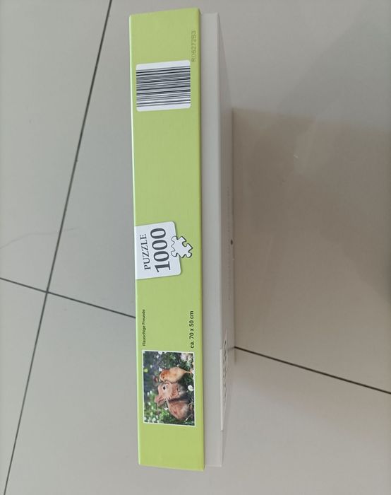 Puzzle de 1000 de piese - Iepuraș drăguț în iarbă