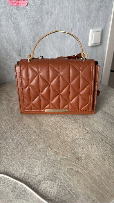 Продам сумочки  и рюкзак новые